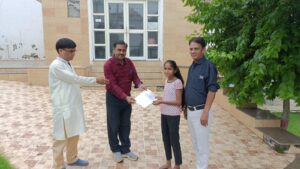 Read more about the article Scholarship checks were distributed to 2 girl students today on 27.8.22